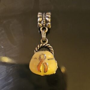 Elegant Gold Charm Pendant